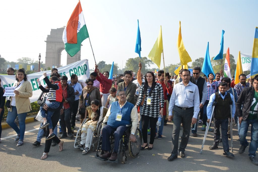 Javed Abidi along with other people with disabilities in a awareness campaign